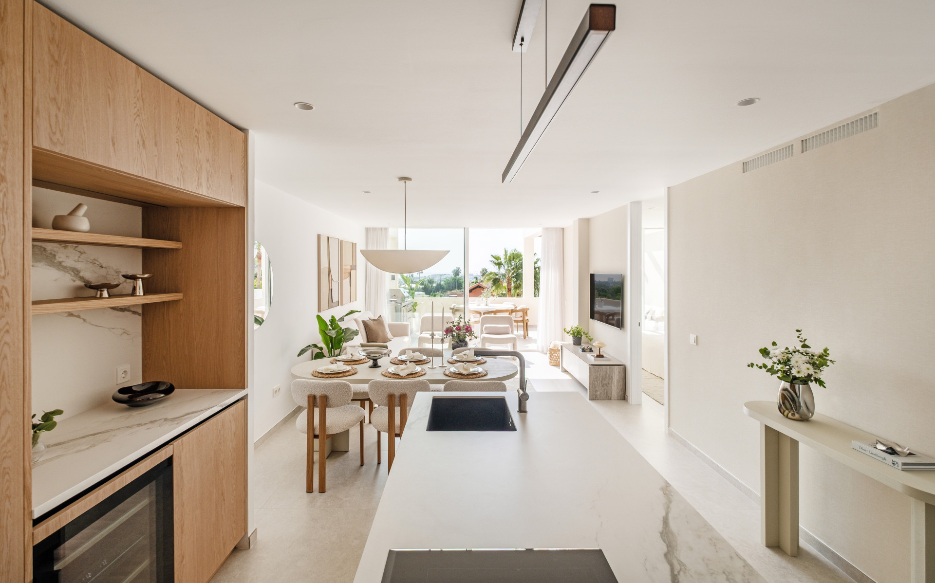 Open-plan kitchen and dining room opening towards the terrace — Renovated Apartment, Nueva Andalucía
