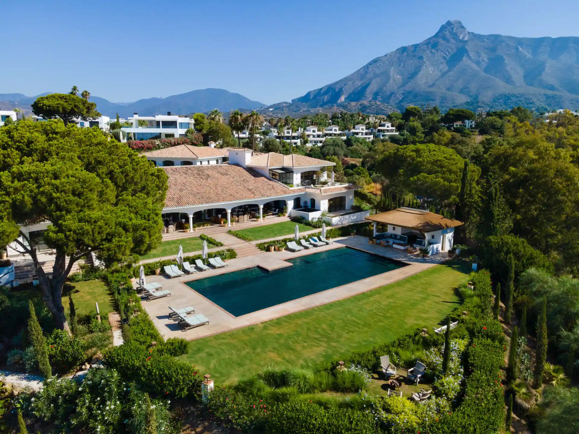 Aerial view of the estate's pool, lawns and gardens on the Golden Mile — Villa La Gratitud, Golden Mile