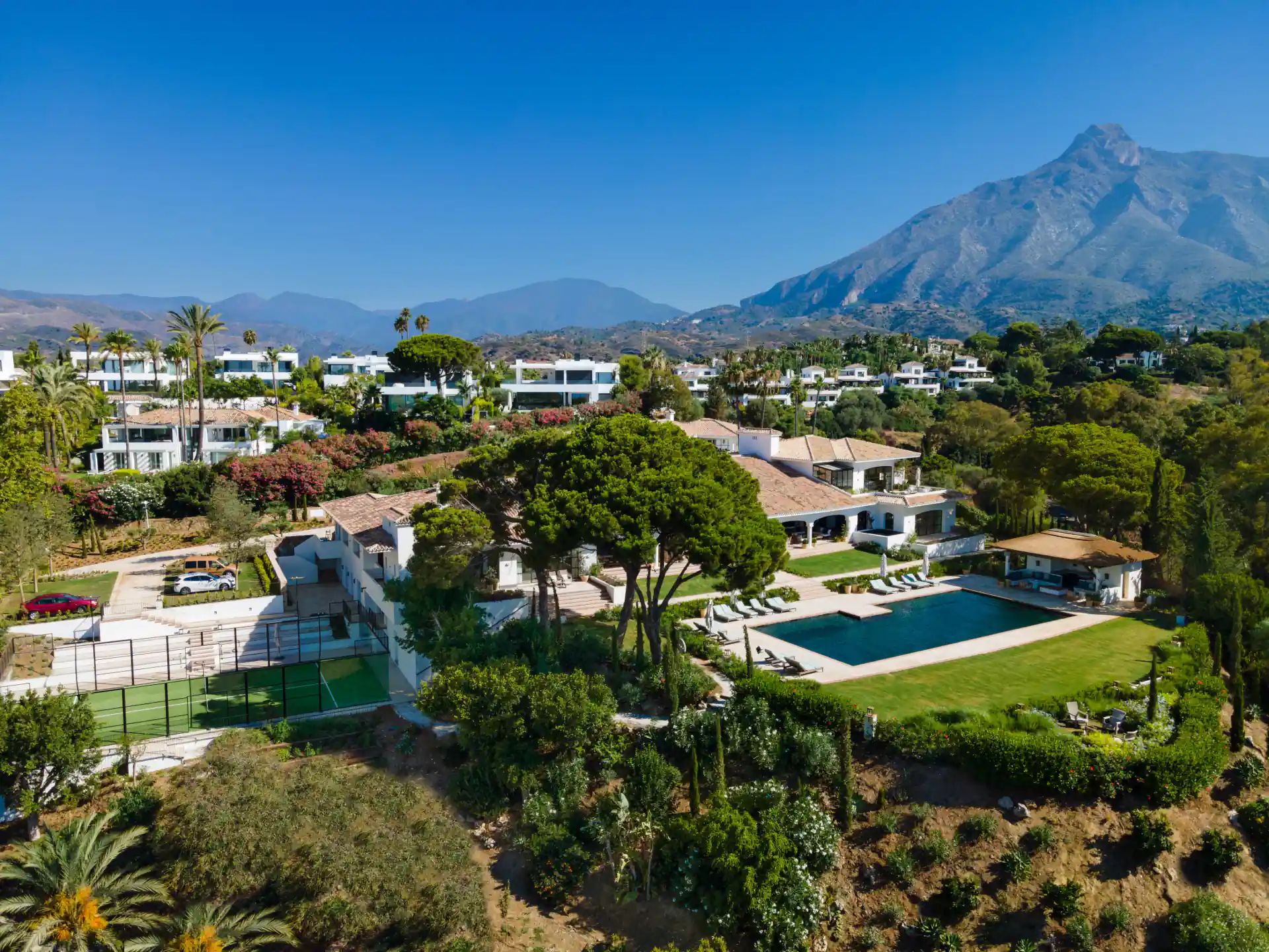 Pool terrace and gardens with La Concha mountain in the distance — Villa La Gratitud, Golden Mile